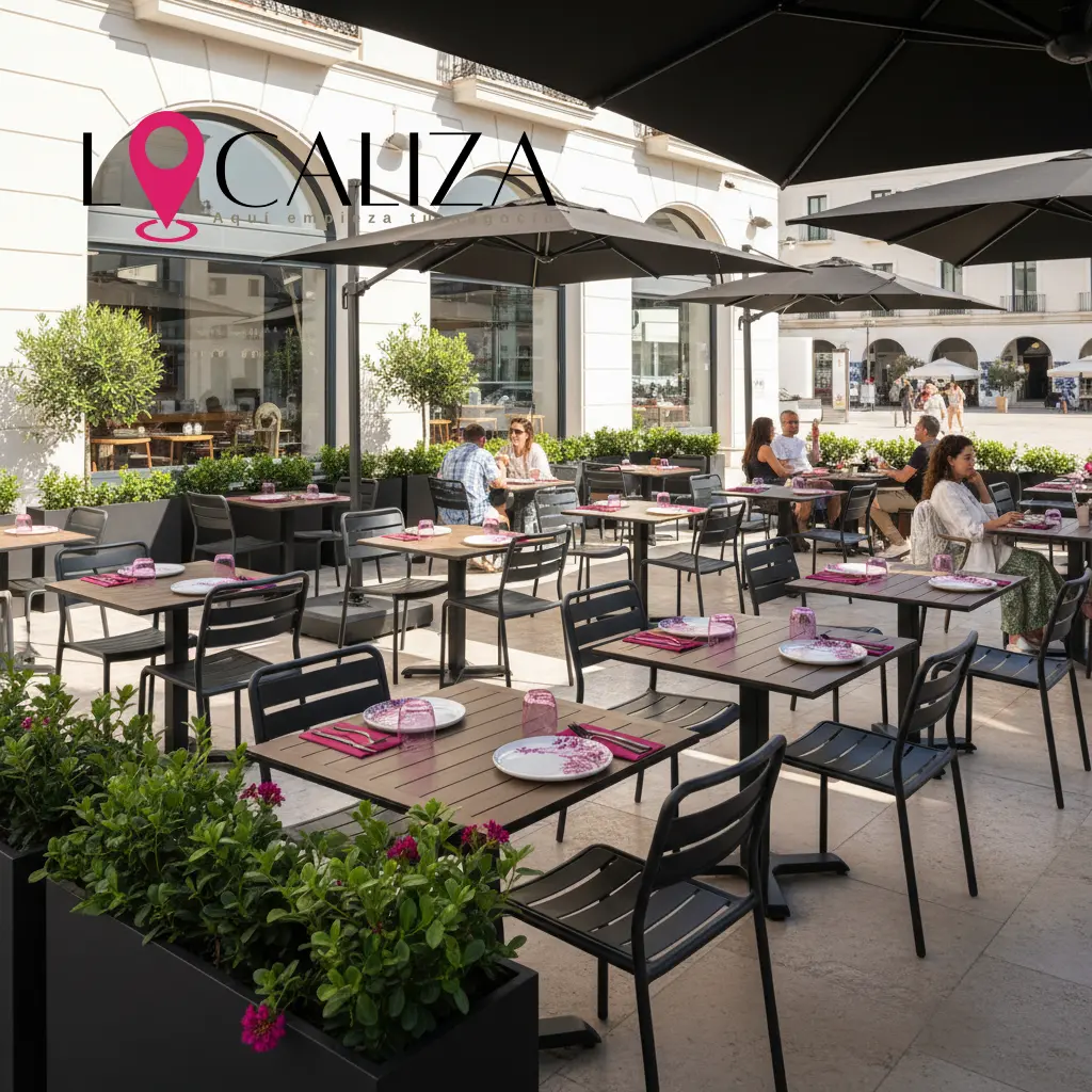 Terraza y veladores de un negocio de hostelería en Sanlúcar de Barrameda, bien iluminada y con mobiliario moderno.
